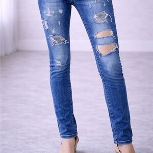 Women's Skinny Ripped Jeans - Mid Blue Distressed Denim